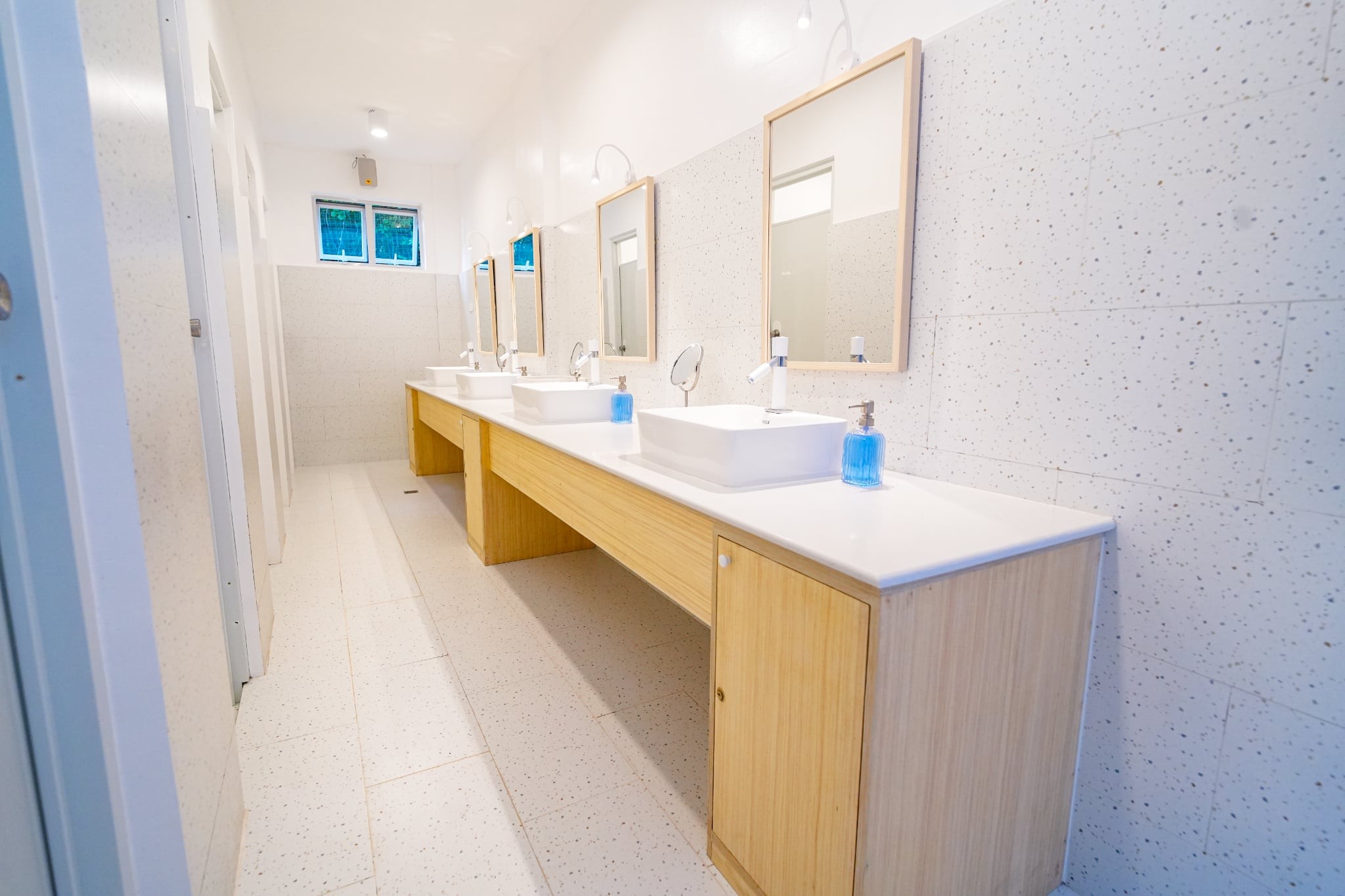 Clean shared bathrooms at SunDay Hostel